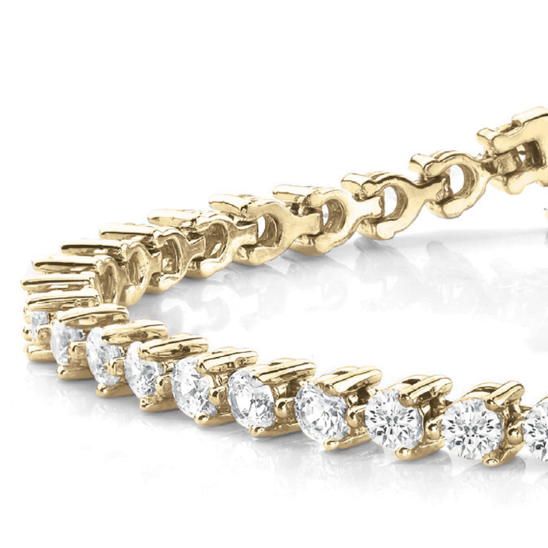 Close-up of the Trinity Bond Tennis Bracelet in 14k gold with lab-grown diamonds in a 3-prong setting.