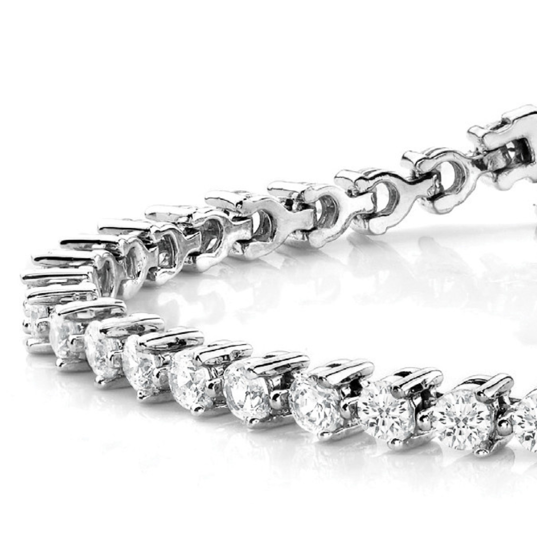 Close-up of the Trinity Bond Tennis Bracelet in 14k gold with lab-grown diamonds in a 3-prong setting.