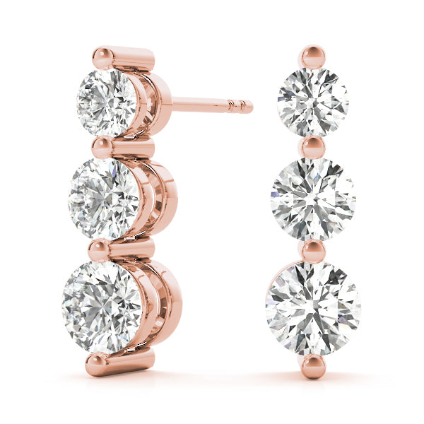 14k gold earrings with three lab-grown diamonds in a vertical design, symbolizing harmony and unity.