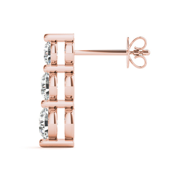 14k gold earrings with three lab-grown diamonds in a vertical design, symbolizing harmony and unity.