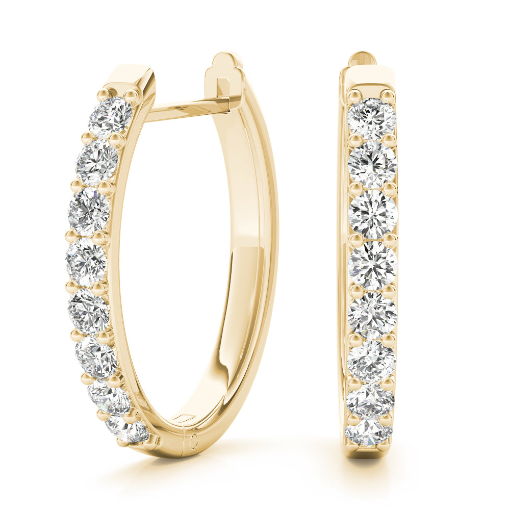 14k gold half-eternity hoop earrings with lab-grown diamonds set along the front half of each hoop.