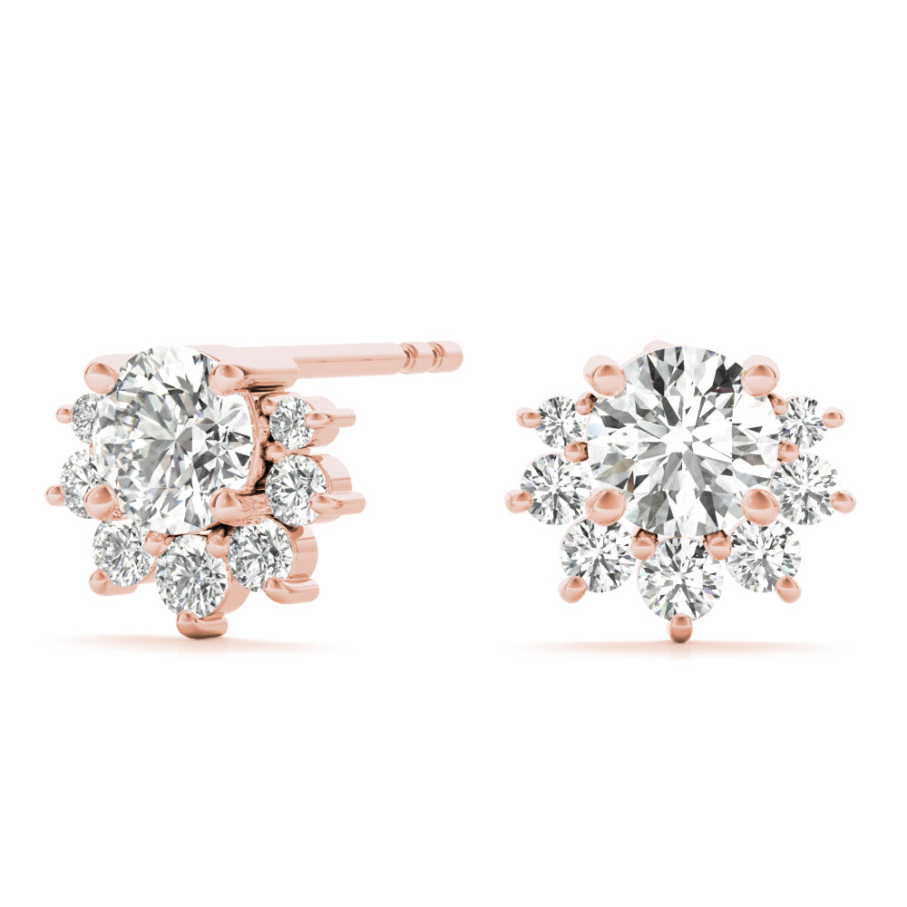 14k gold diamond blossom stud earrings with a central lab-grown diamond and a halo of smaller diamonds in a floral design.