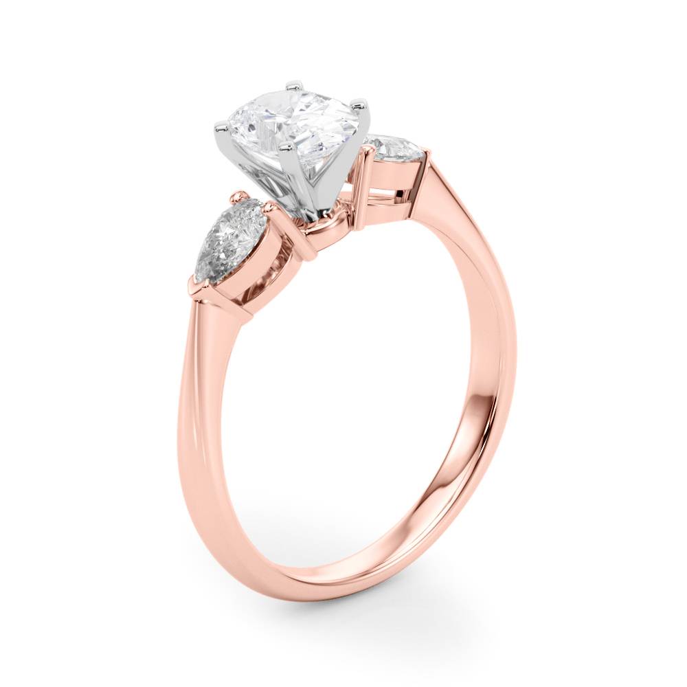 14k gold Trinity Embrace Ring with central oval lab-grown diamond and two pear-shaped diamonds.