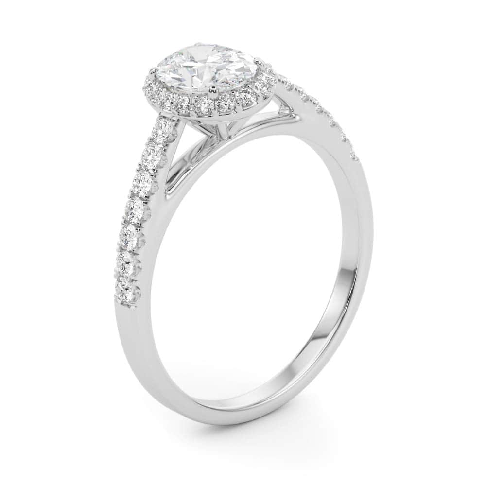 14k gold oval diamond halo engagement ring with pavé-set diamonds symbolizing eternal love.