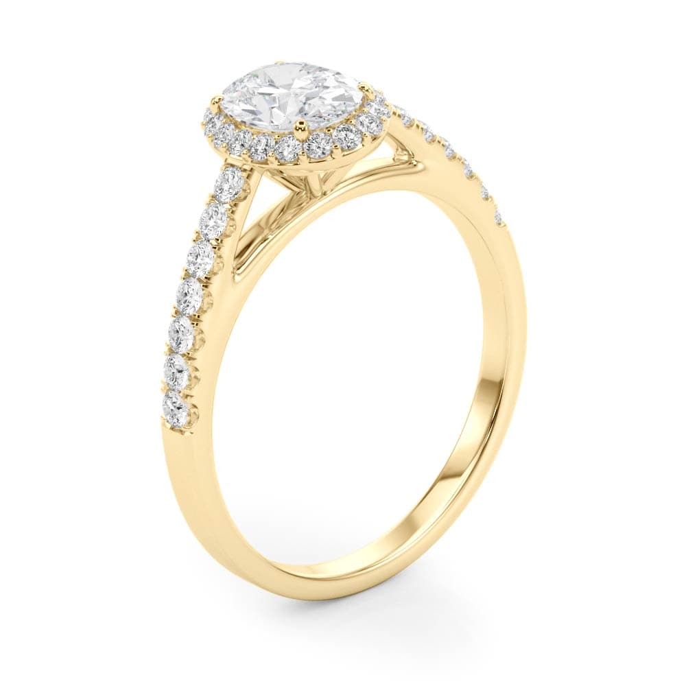 14k gold oval diamond halo engagement ring with pavé-set diamonds symbolizing eternal love.