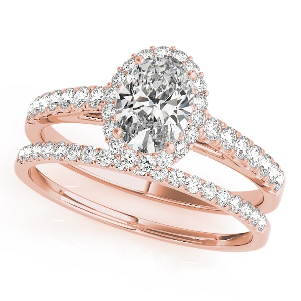 14k gold oval diamond halo engagement ring with pavé-set diamonds symbolizing eternal love.