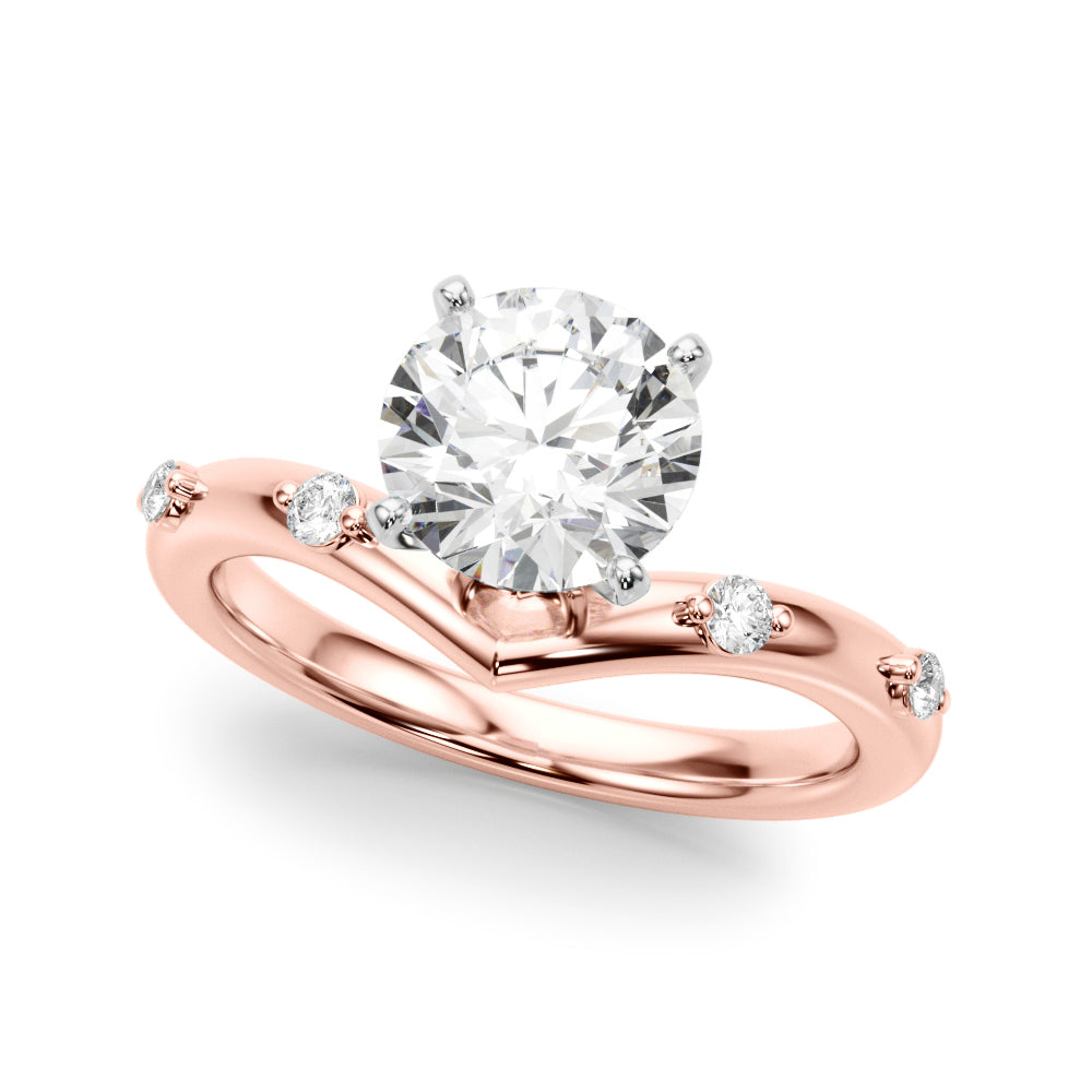 14k gold vine-inspired engagement ring with a round-cut lab-grown diamond center and delicate diamond accents along the band.