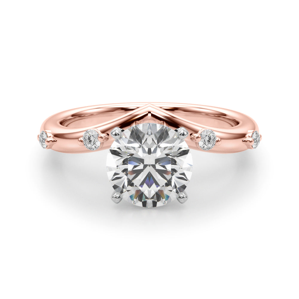 14k gold vine-inspired engagement ring with a round-cut lab-grown diamond center and delicate diamond accents along the band.