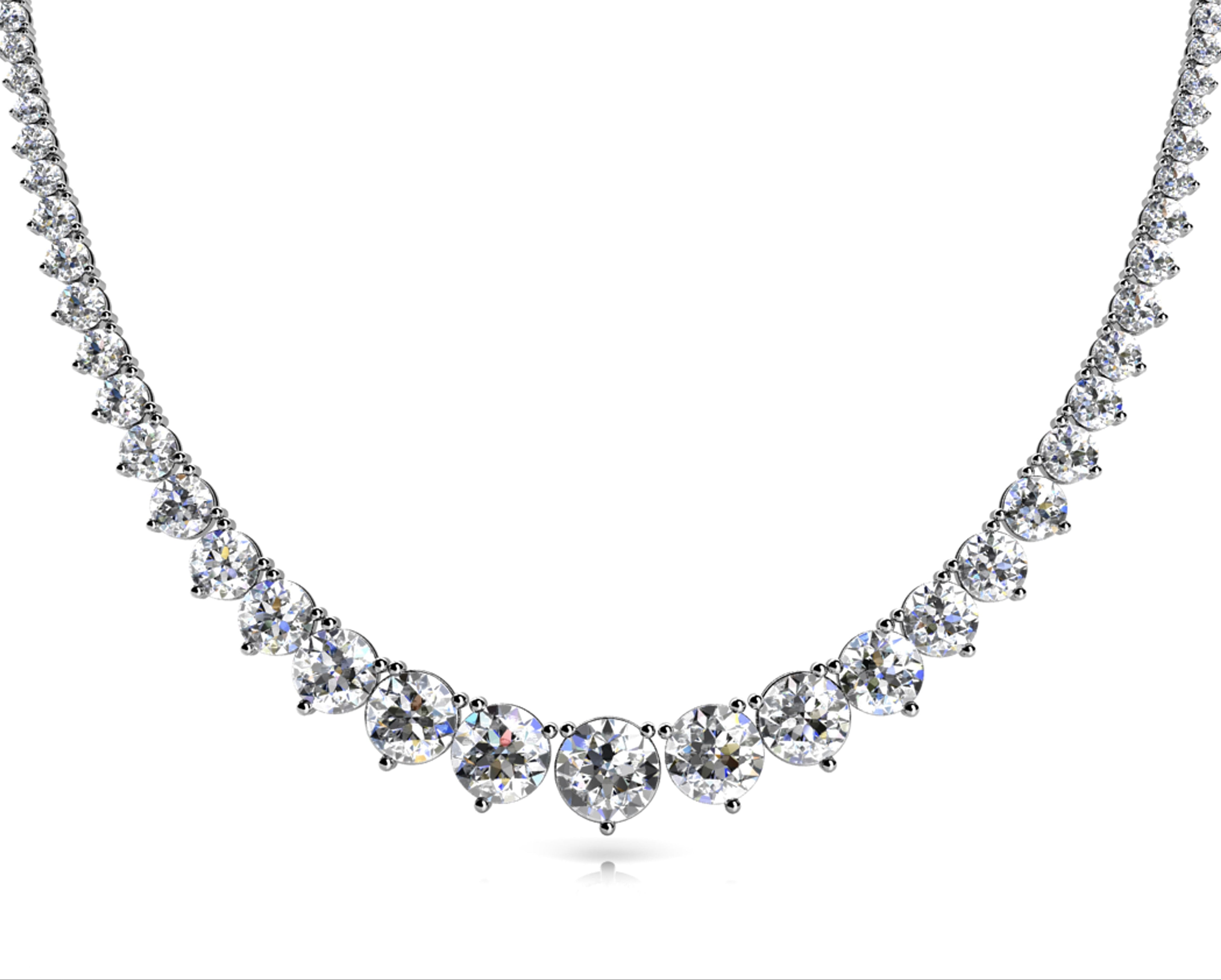 14k gold graduated diamond necklace featuring a three-prong setting with diamonds increasing in size toward the center, symbolizing growth and continuity.
