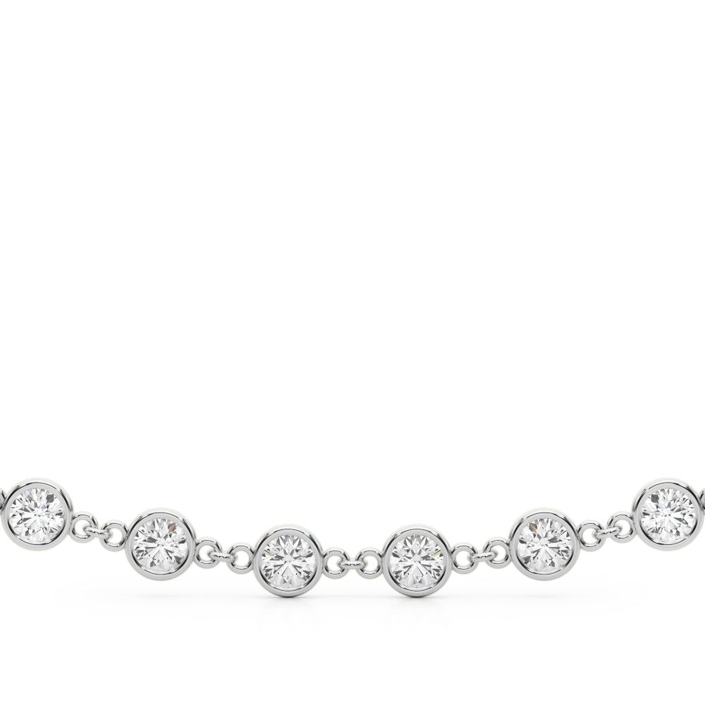 14k gold bezel-set diamond necklace with elongated links, symbolizing connection and timeless elegance.
