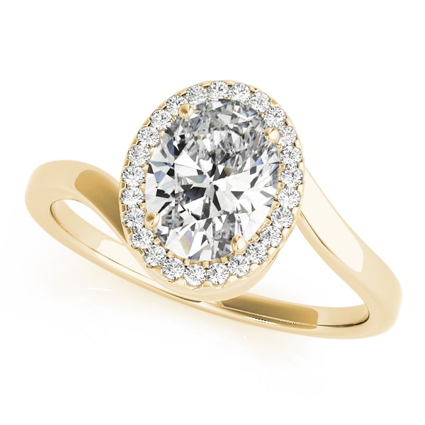 Oval halo lab-grown diamond ring in 14k gold with smaller diamonds encircling the center stone.