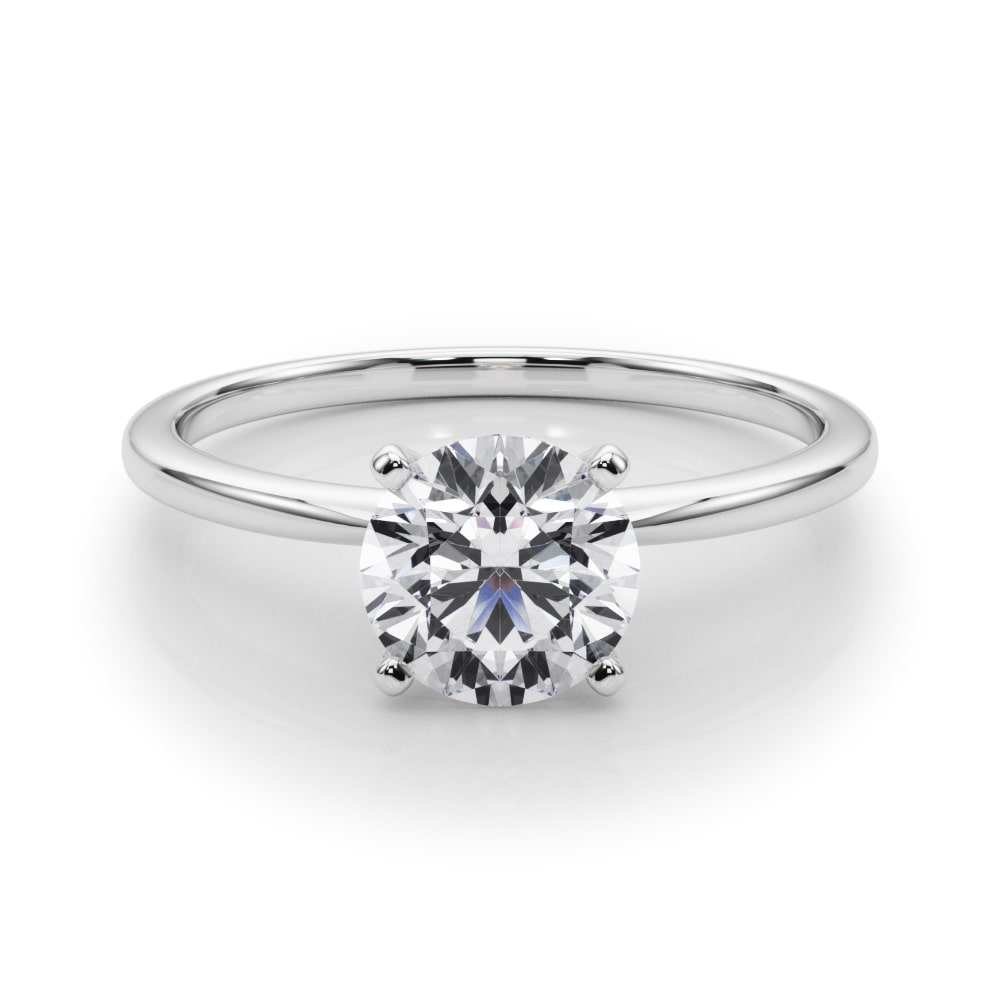 Timeless Solitaire Ring in 14k white gold with a round lab-grown diamond in a four-prong setting.