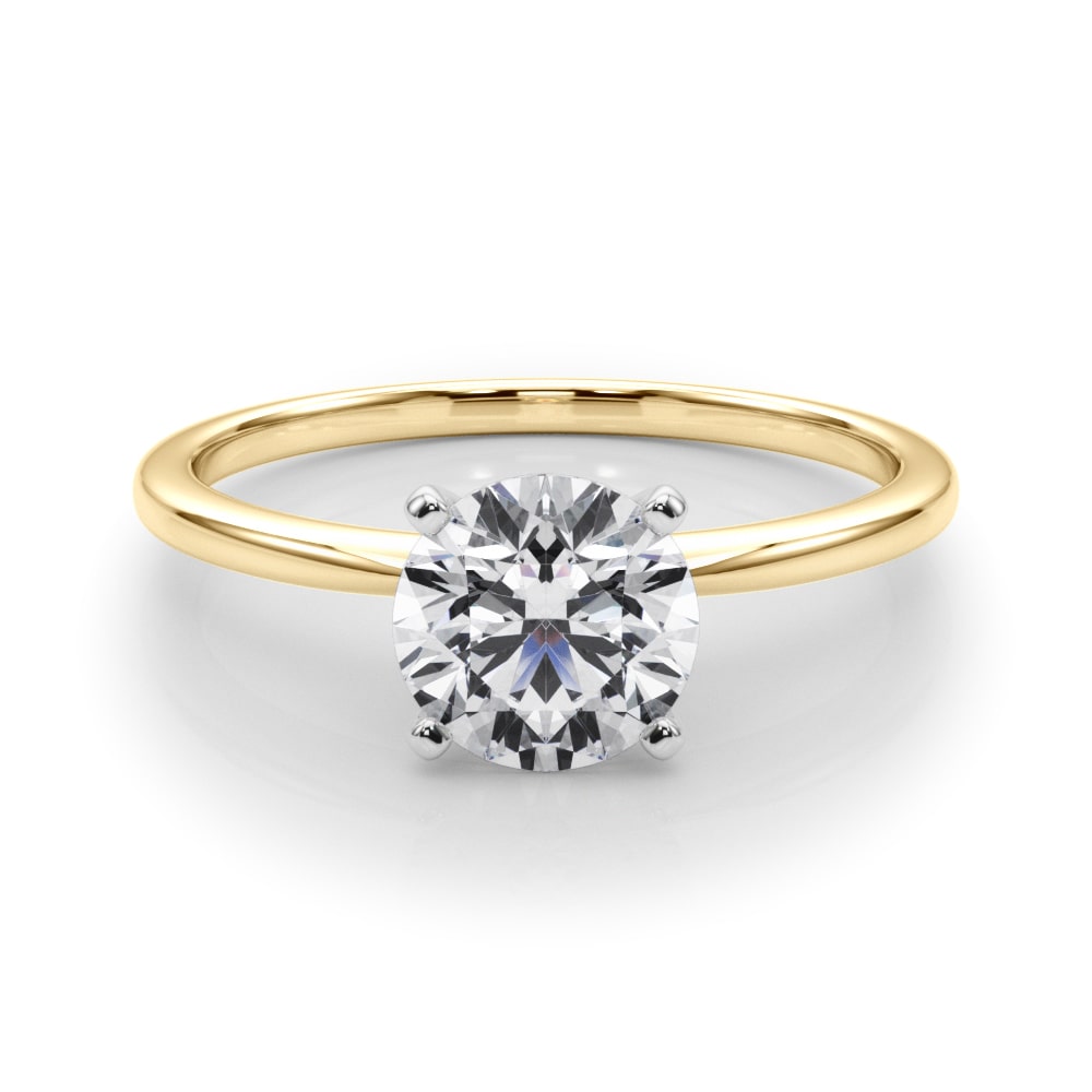 Timeless Solitaire Ring in 14k white gold with a round lab-grown diamond in a four-prong setting.