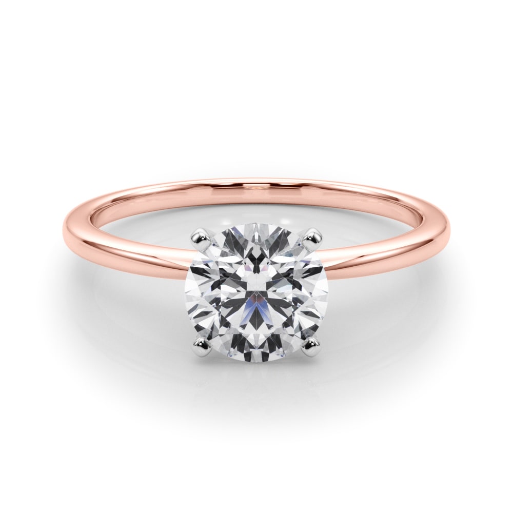 Timeless Solitaire Ring in 14k white gold with a round lab-grown diamond in a four-prong setting.