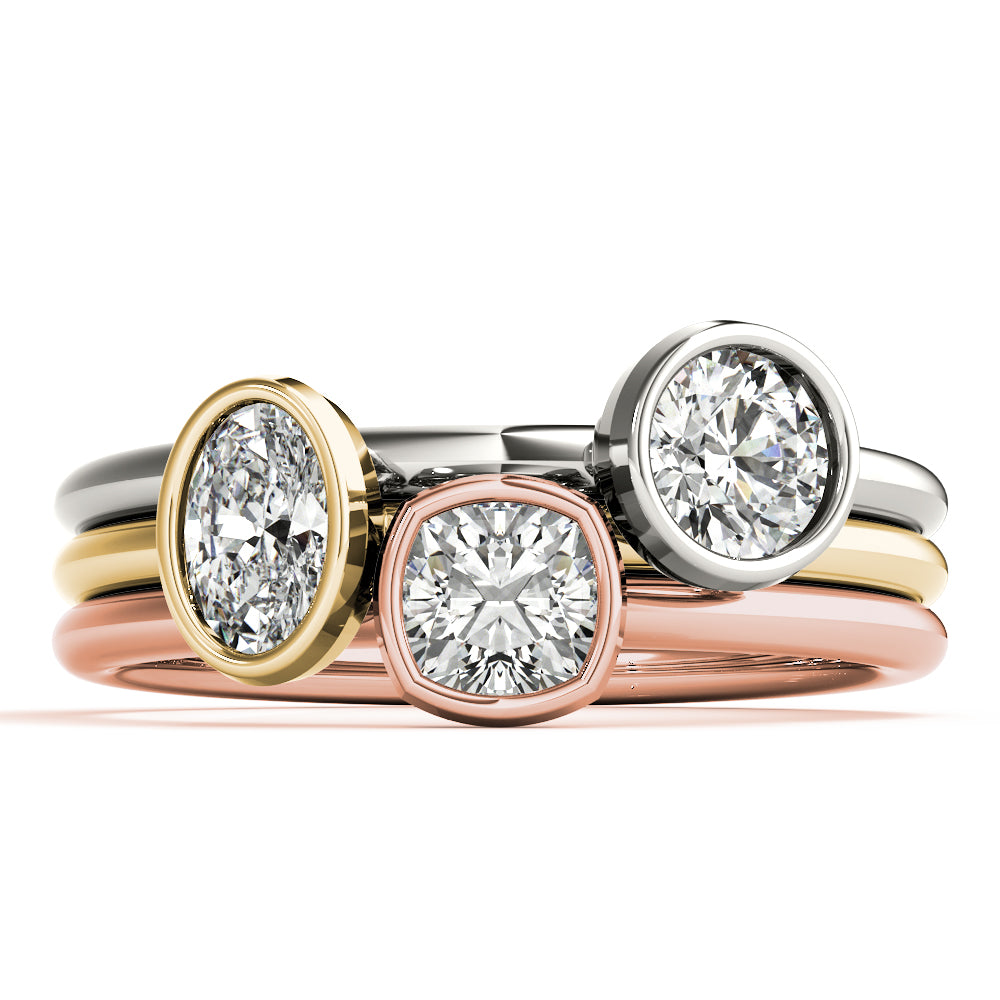 14k gold oval-cut diamond ring with a bezel setting, symbolizing unity and protection.