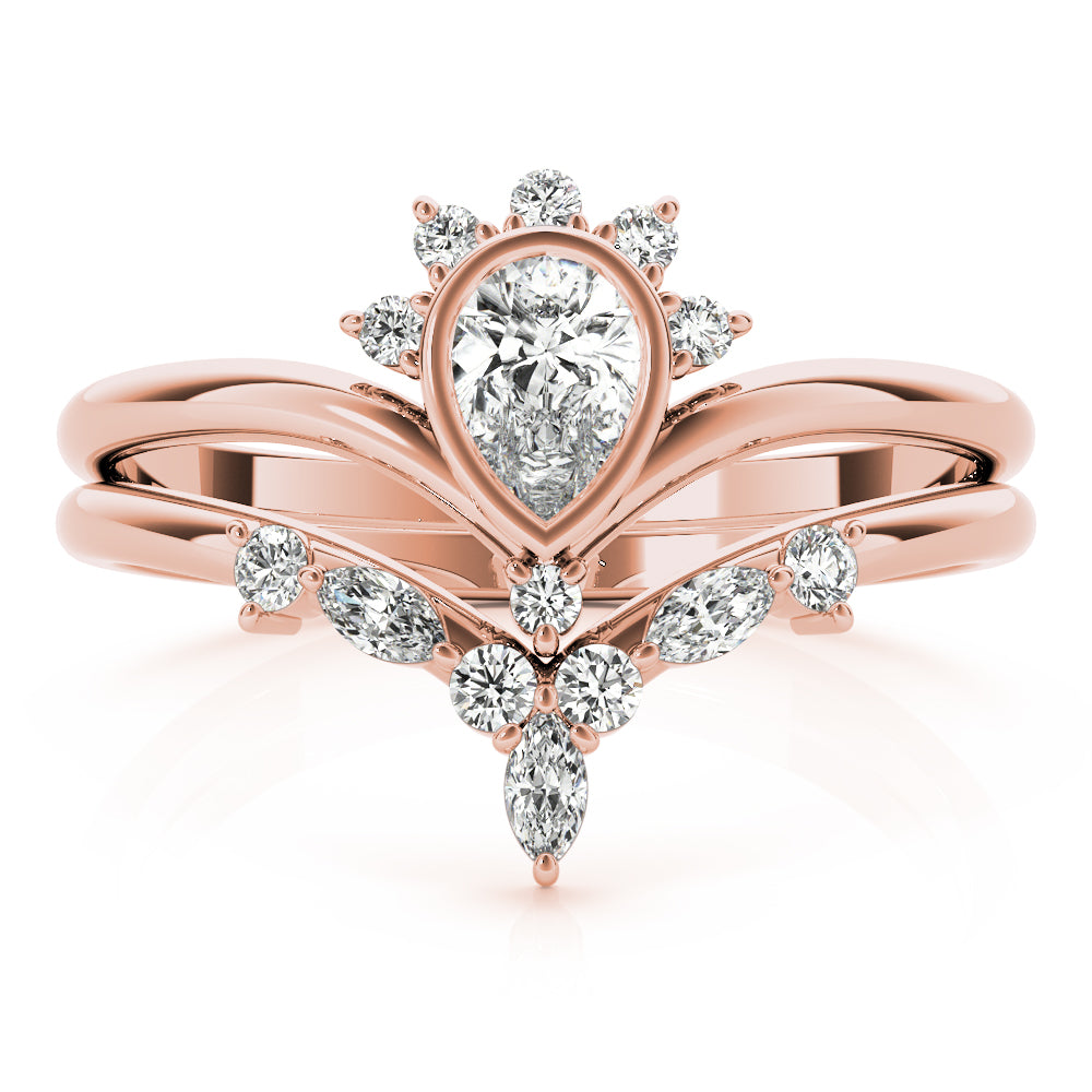 Blossom Cluster Diamond Ring featuring floral-inspired diamond arrangement.
Nature-inspired diamond ring with marquise, round, and pear-shaped stones in 14k gold.
Elegant diamond cluster ring symbolizing growth and renewal.