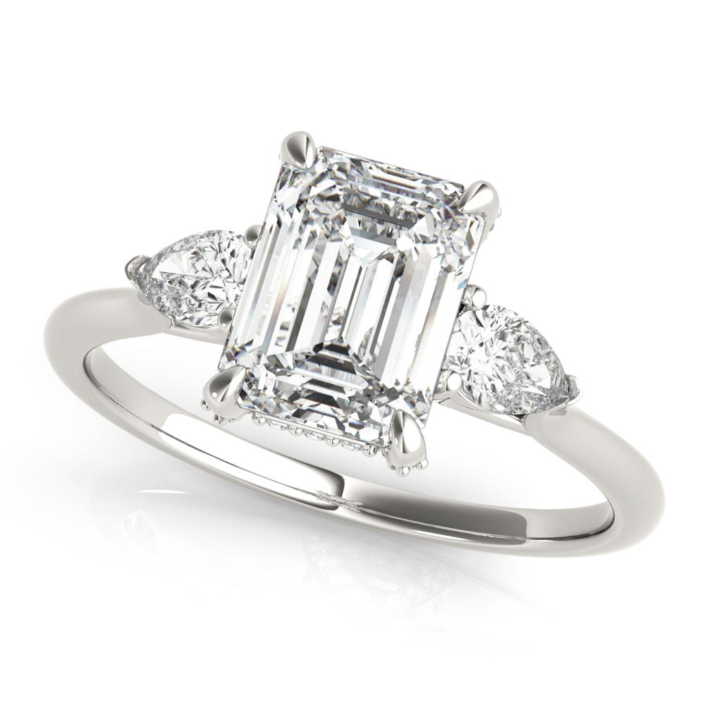 Emerald-cut lab-grown diamond ring in 14k gold with pear-shaped diamond side stones.