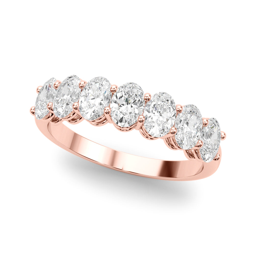 14k white gold ring with oval-cut lab-grown diamonds arranged in a graceful curve.