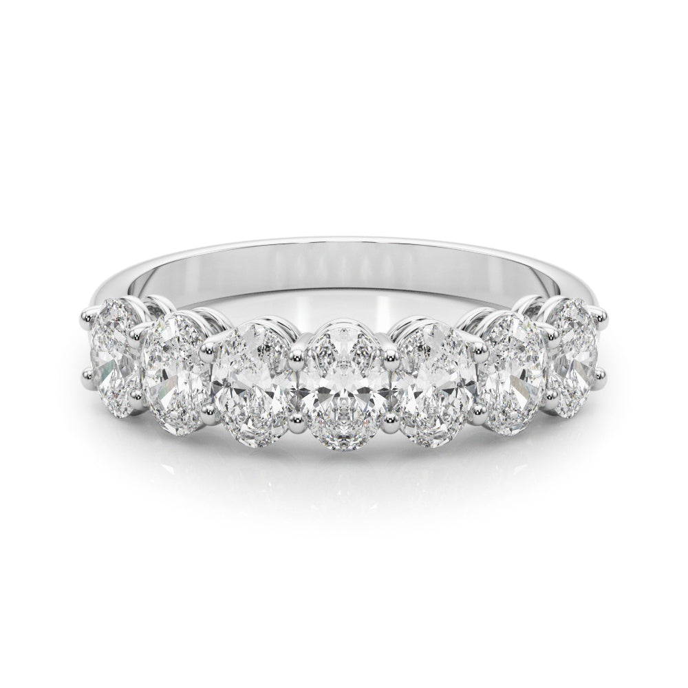 14k white gold ring with oval-cut lab-grown diamonds arranged in a graceful curve.