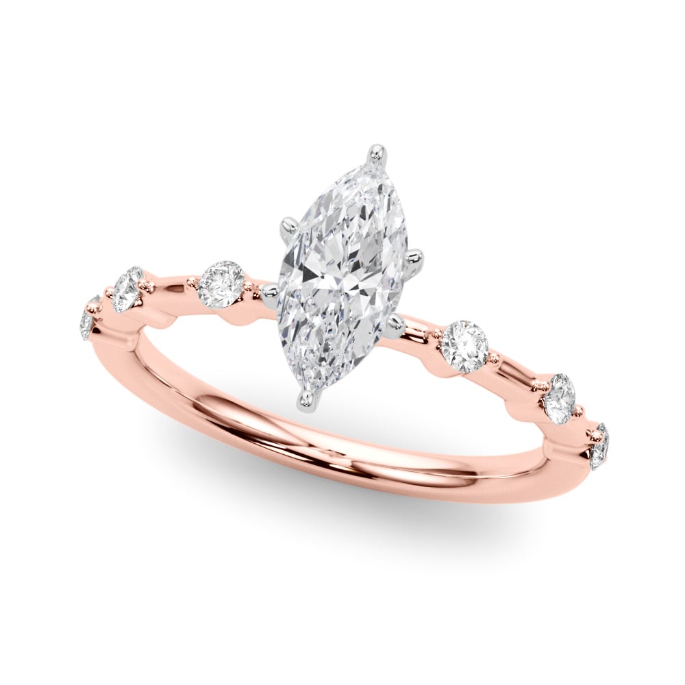 14k yellow gold Infinite Grace Ring featuring a marquise-cut Lovinity diamond and round diamonds set along the band.