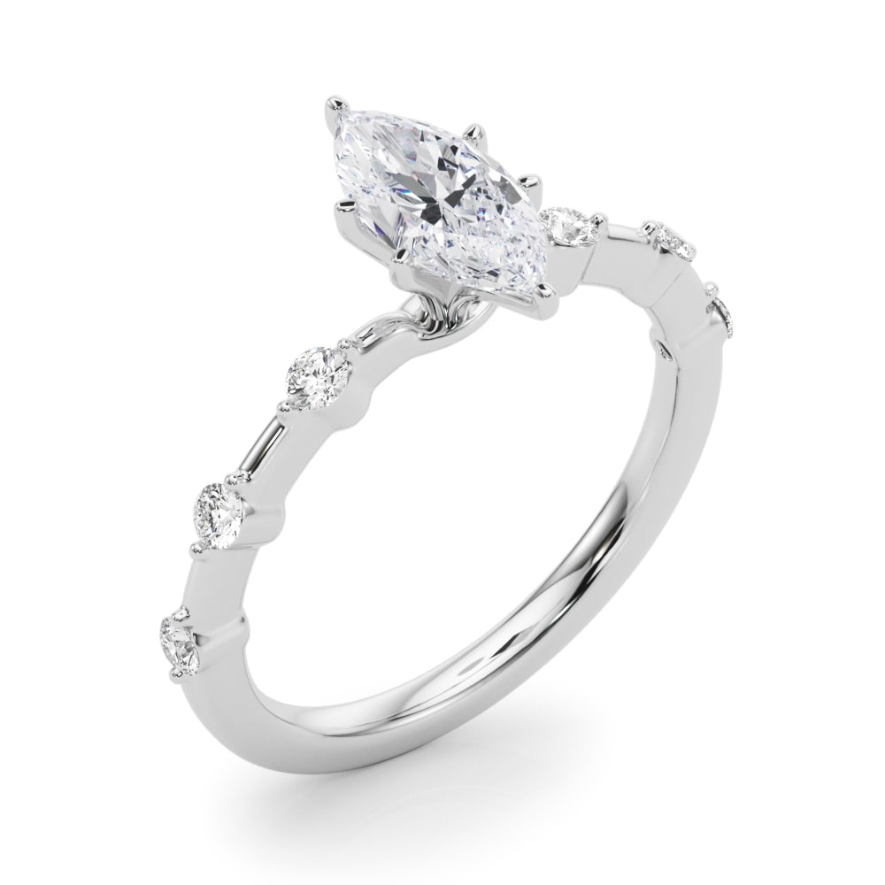 14k yellow gold Infinite Grace Ring featuring a marquise-cut Lovinity diamond and round diamonds set along the band.