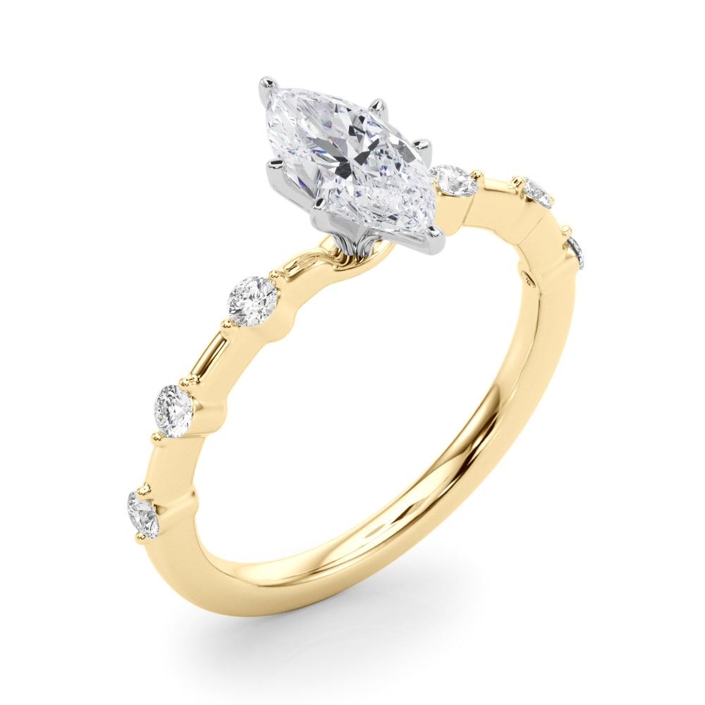 14k yellow gold Infinite Grace Ring featuring a marquise-cut Lovinity diamond and round diamonds set along the band.