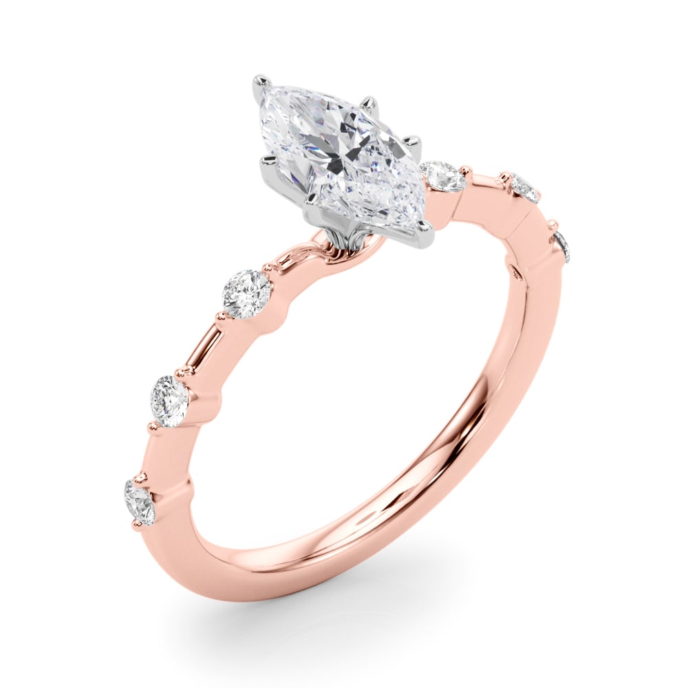 14k yellow gold Infinite Grace Ring featuring a marquise-cut Lovinity diamond and round diamonds set along the band.