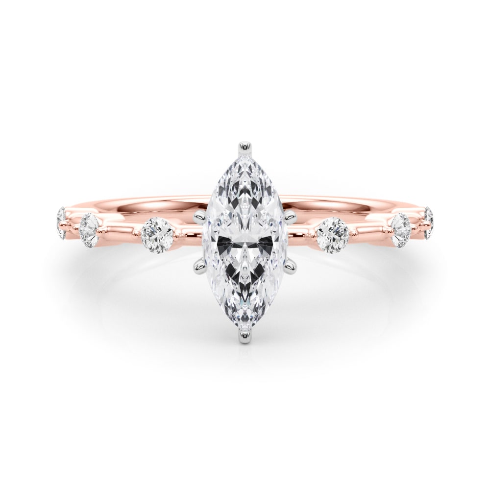 14k yellow gold Infinite Grace Ring featuring a marquise-cut Lovinity diamond and round diamonds set along the band.