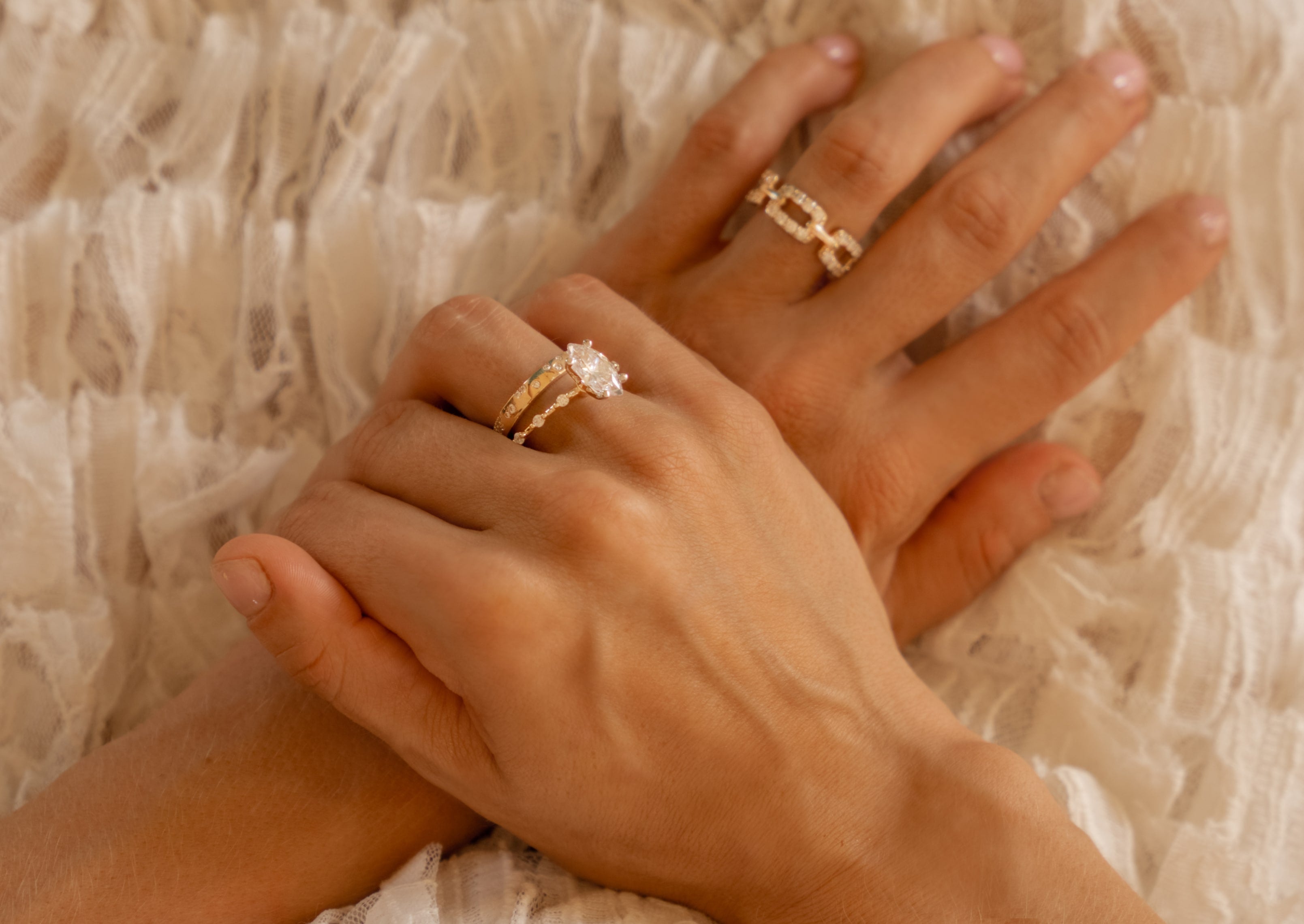 14k yellow gold Infinite Grace Ring featuring a marquise-cut Lovinity diamond and round diamonds set along the band.