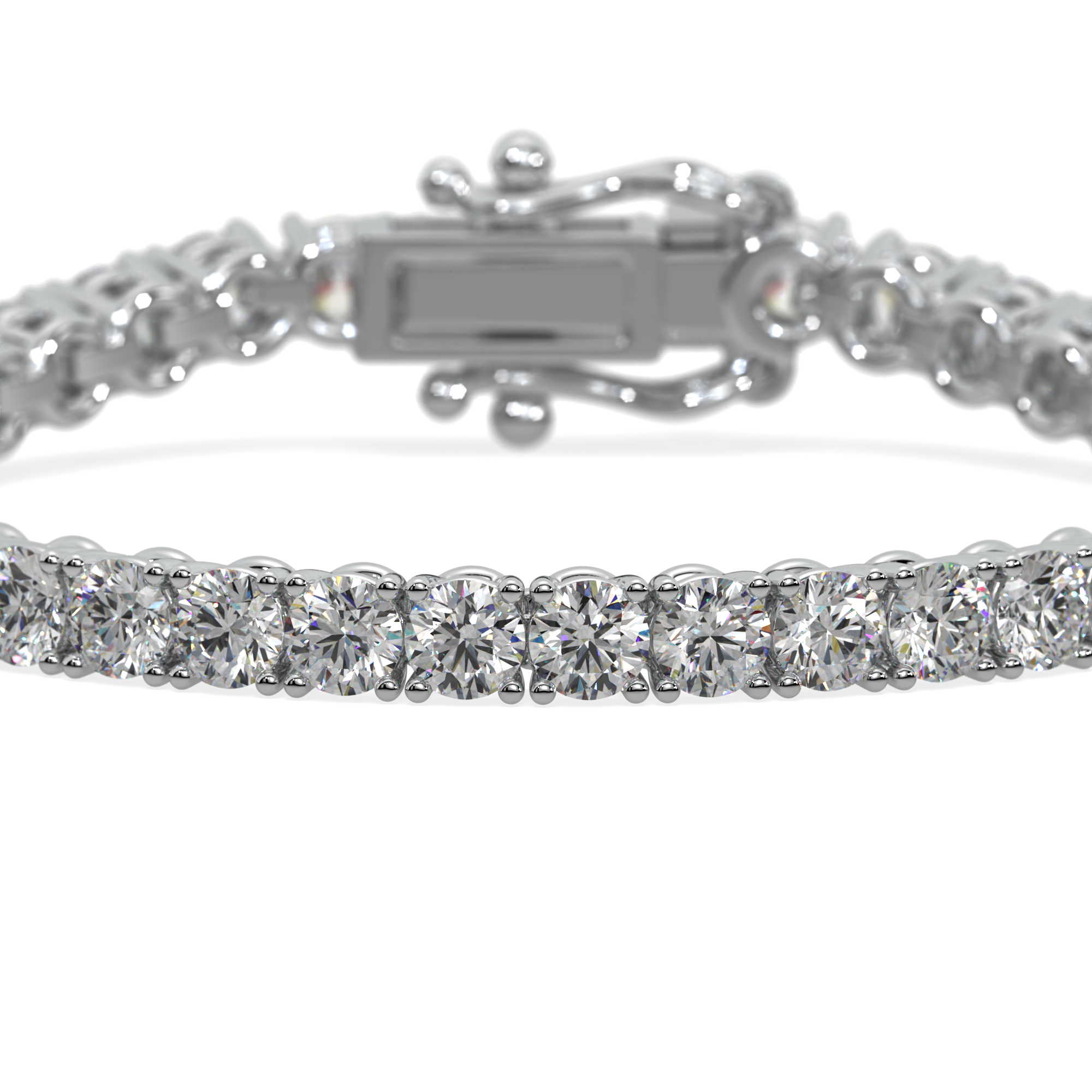 Close-up of a 14k gold tennis bracelet with lab-grown diamonds in a secure 4-prong setting.