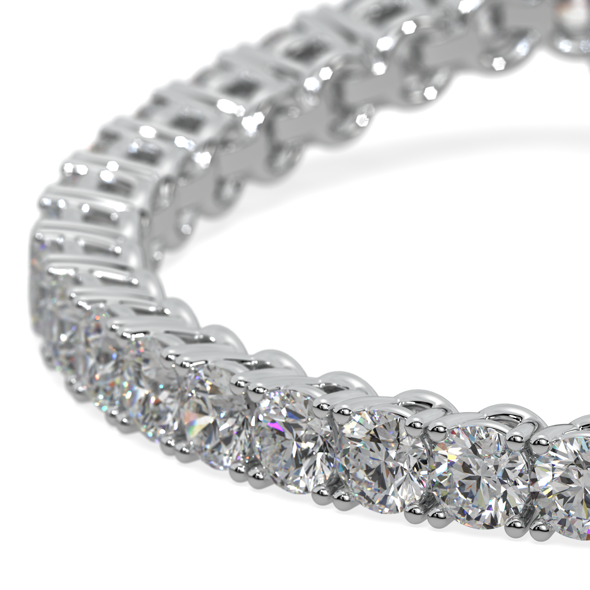Close-up of a 14k gold tennis bracelet with lab-grown diamonds in a secure 4-prong setting.