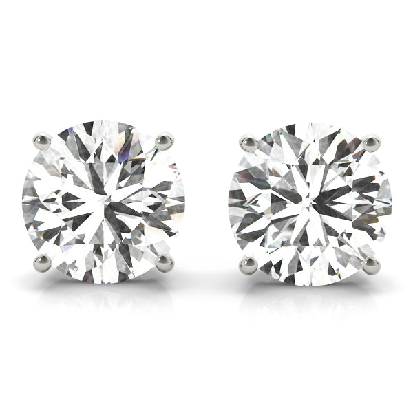 14k white gold diamond stud earrings featuring two round Lovinity diamonds in a four-prong setting. Minimalist, elegant, and versatile jewelry piece.