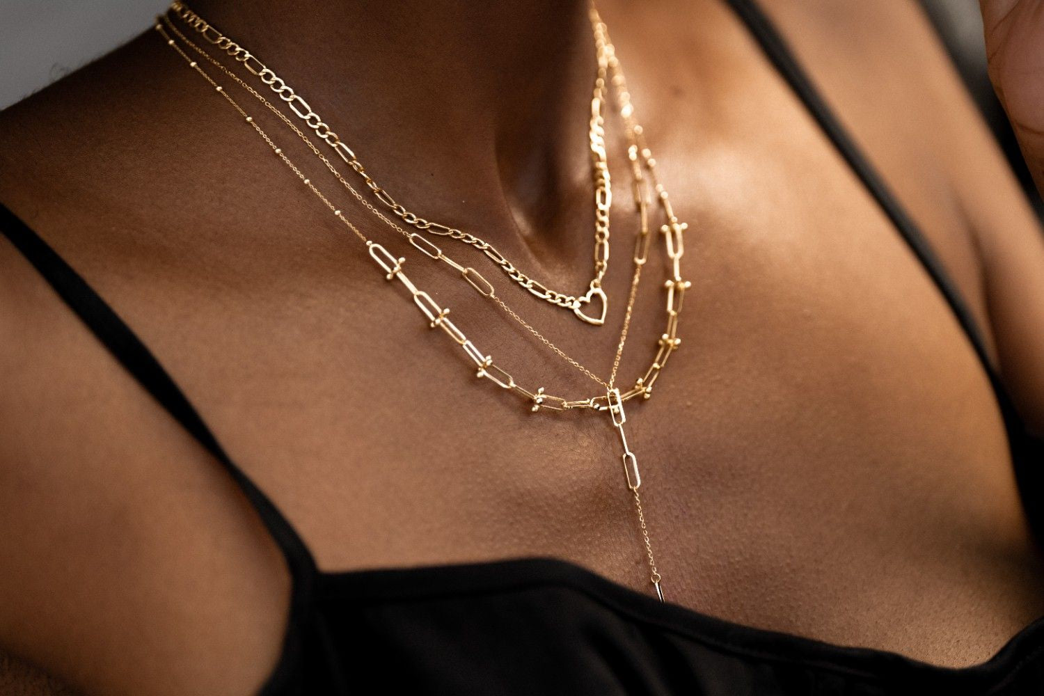 14k gold necklace with elongated links, symbolizing connection and continuous growth.