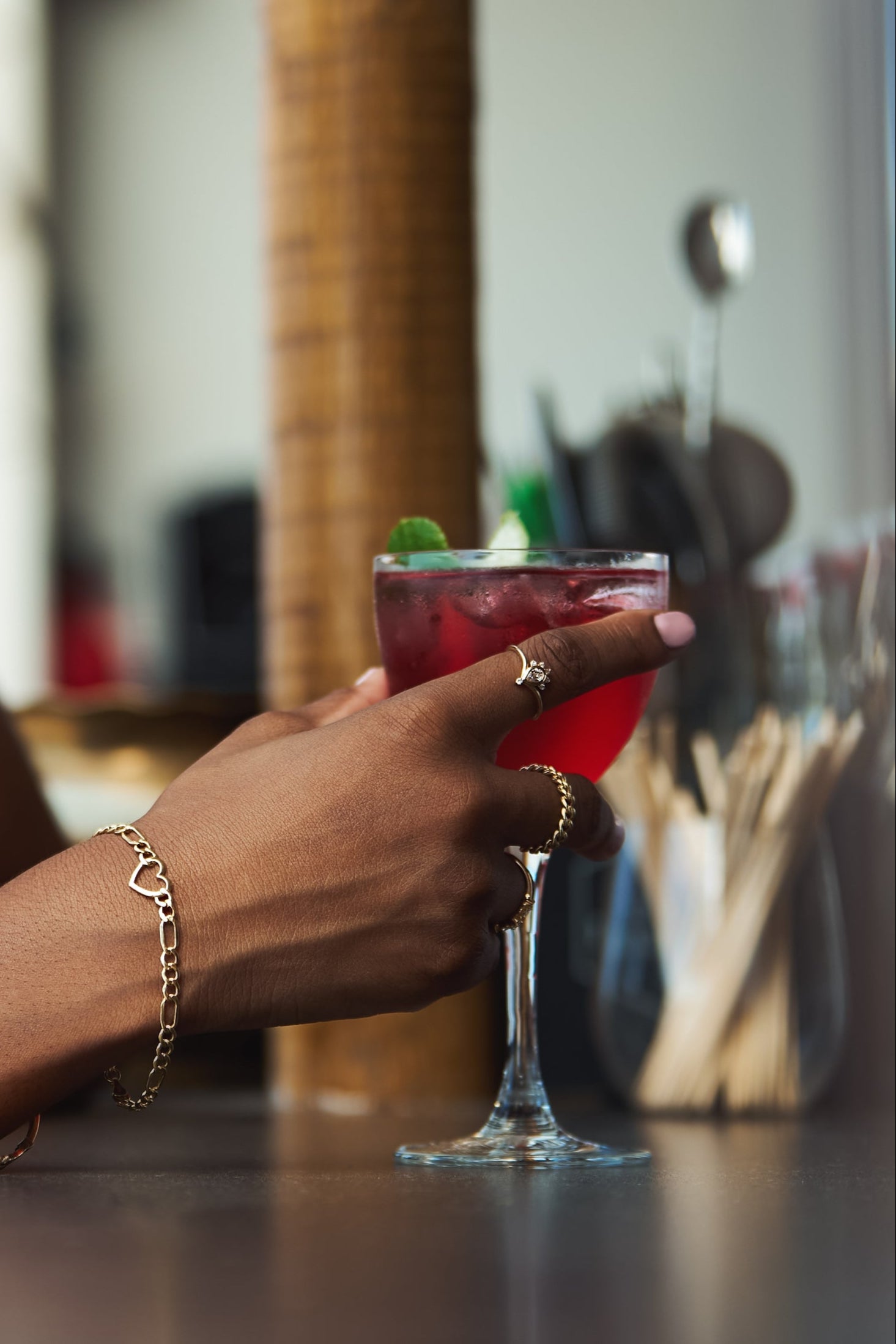 14k gold chain bracelet with geometric heart charm, symbolizing love and connection.