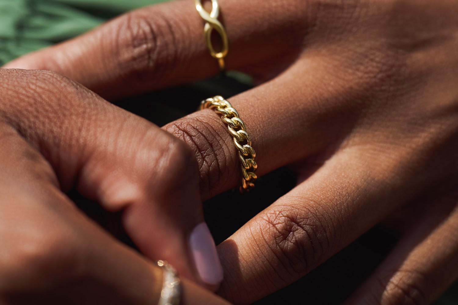14k Gold Chain Link Ring with interlocking links symbolizing strength and unity.