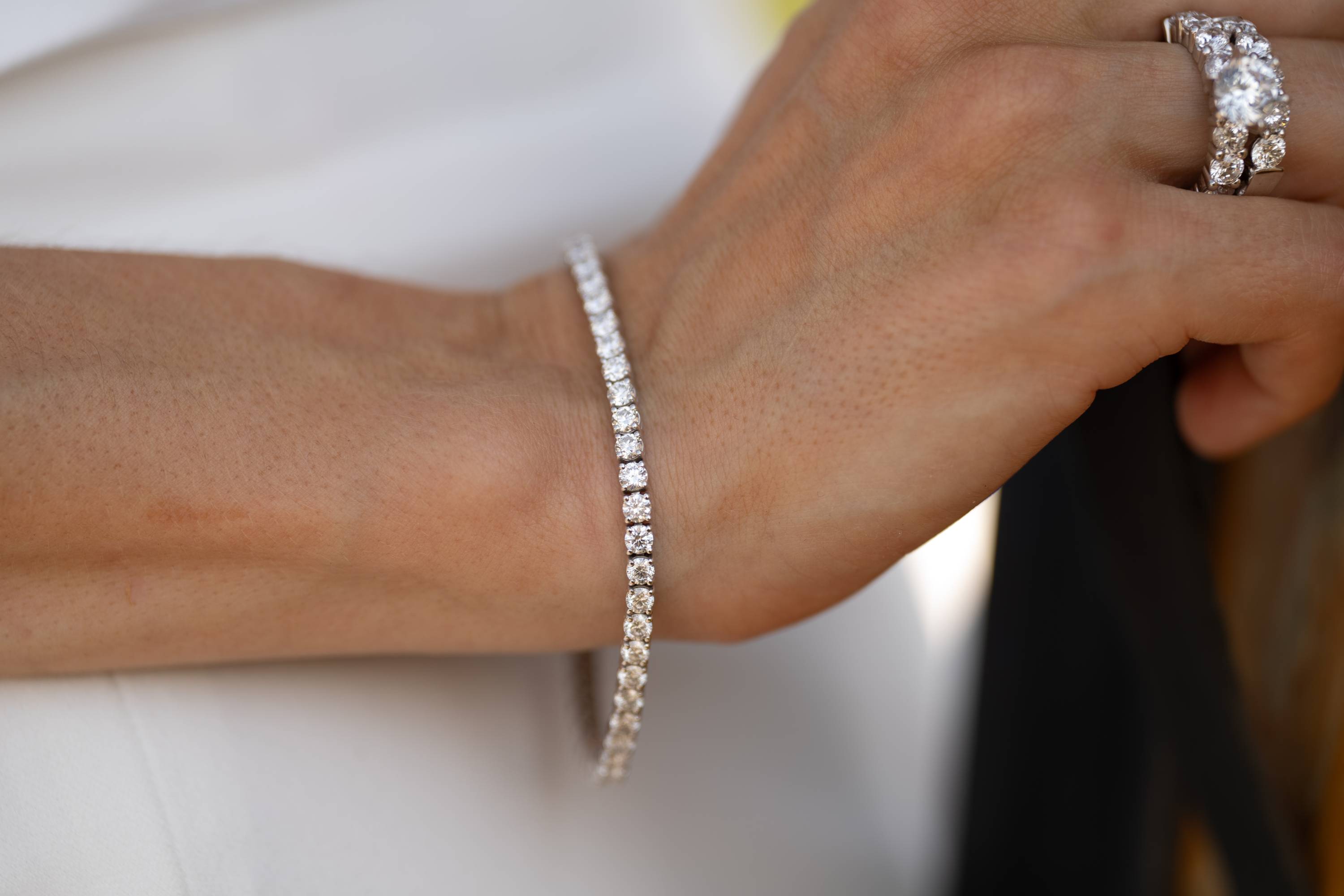 Elegant tennis bracelet featuring lab-grown diamonds in a classic 4-prong setting, crafted in 14k gold.