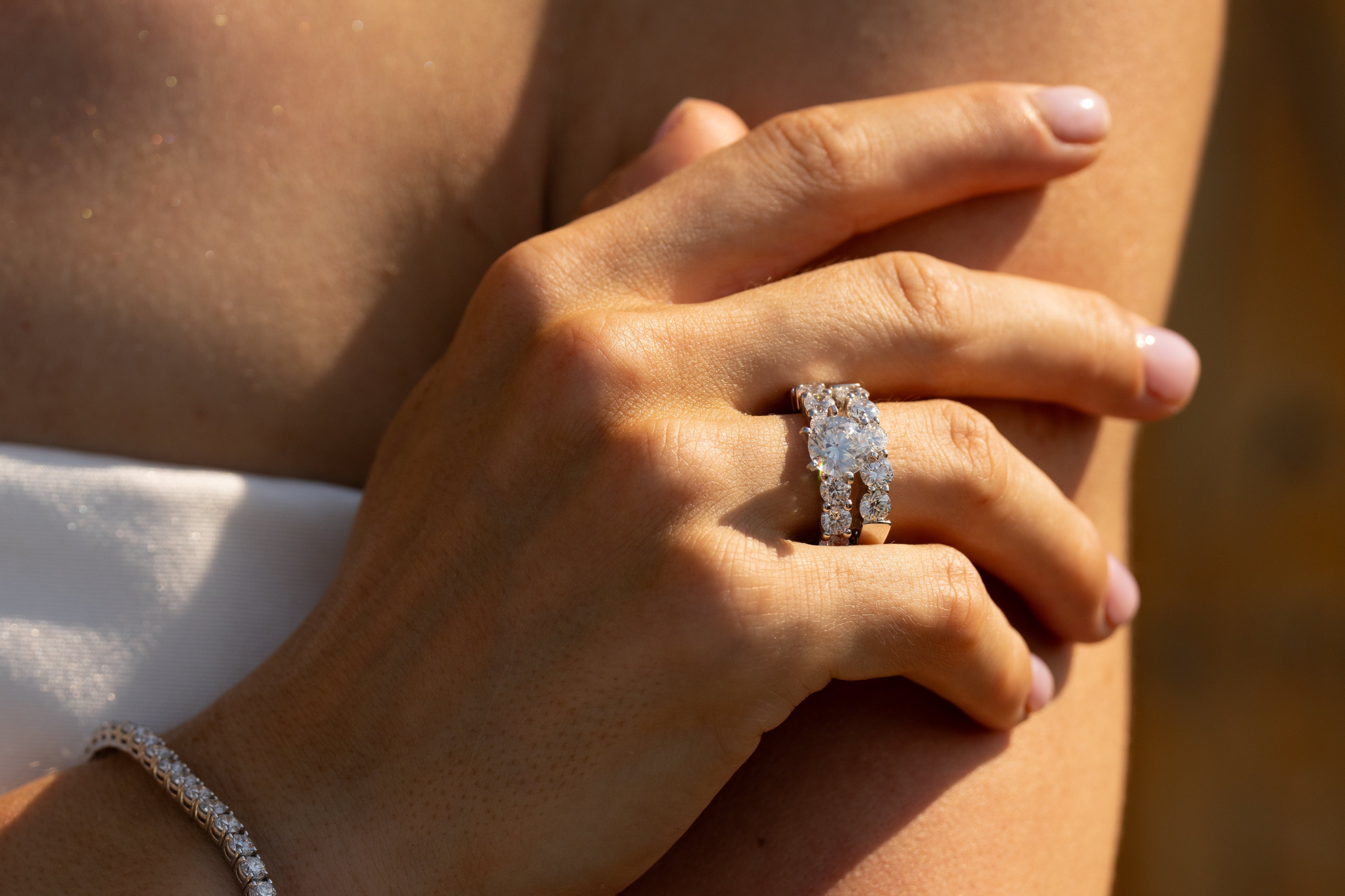 14k white gold Cathedral Grace Ring with a round lab-grown diamond center stone, elevated in a cathedral setting, accented by pavé diamonds along the shank.