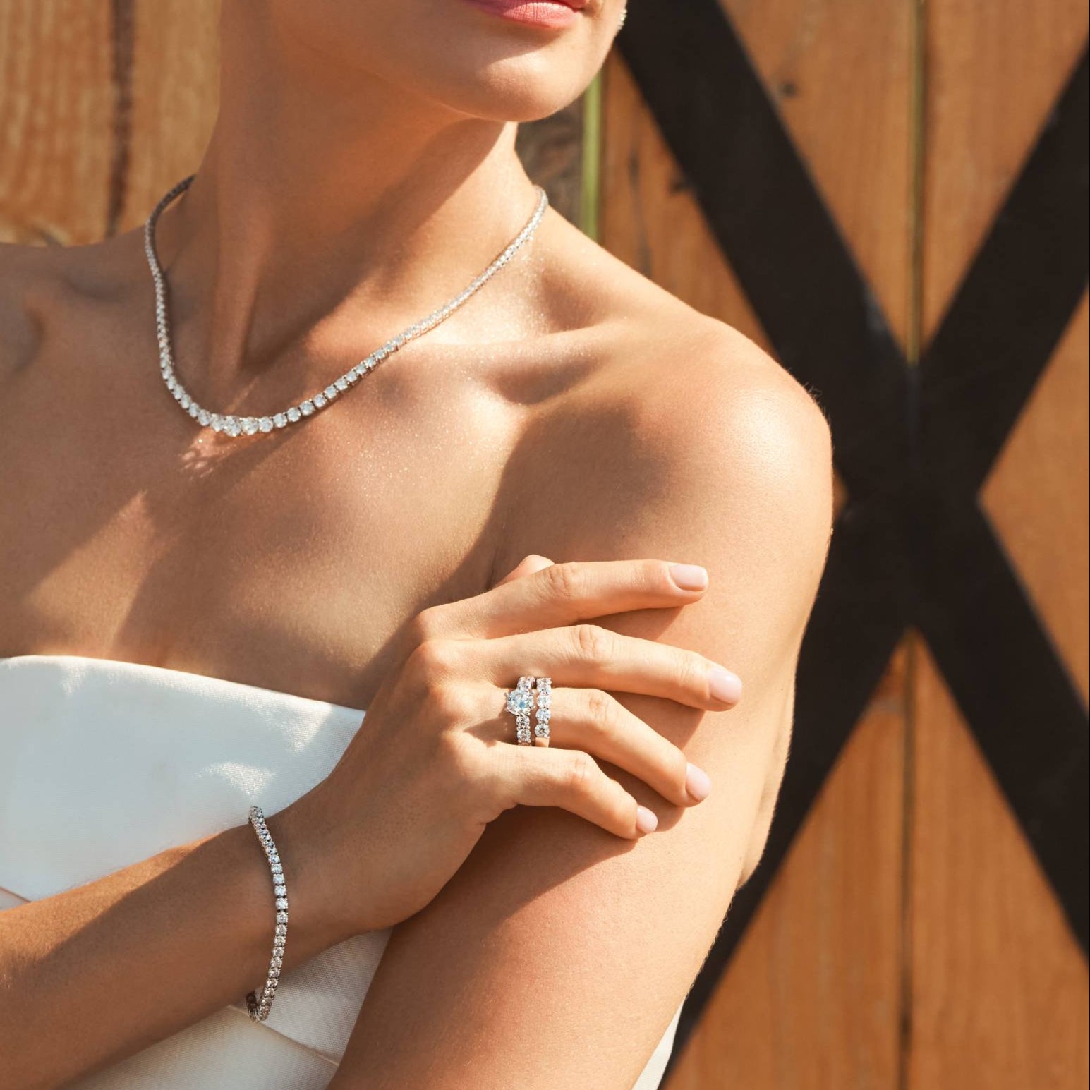 14k white gold diamond band with round-cut lab-grown diamonds in a shared prong setting.