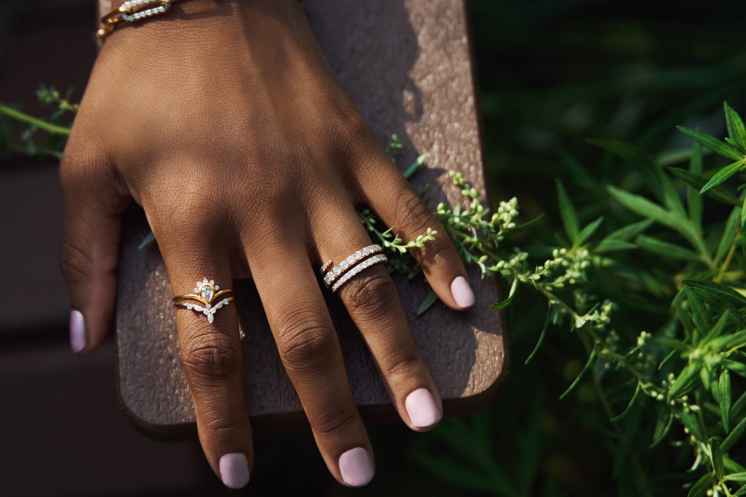 Blossom Cluster Diamond Ring featuring floral-inspired diamond arrangement.
Nature-inspired diamond ring with marquise, round, and pear-shaped stones in 14k gold.
Elegant diamond cluster ring symbolizing growth and renewal.