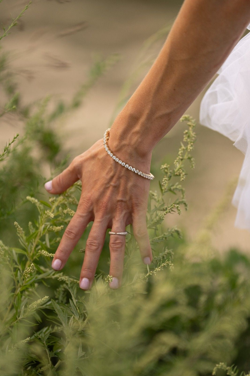 14k gold crossover diamond band featuring lab-grown diamonds, symbolizing unity and protection.