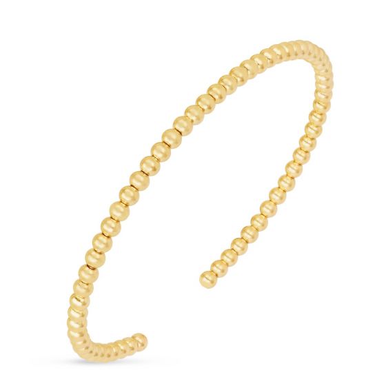14k gold beaded cuff bracelet, representing modern elegance and minimalist sophistication.