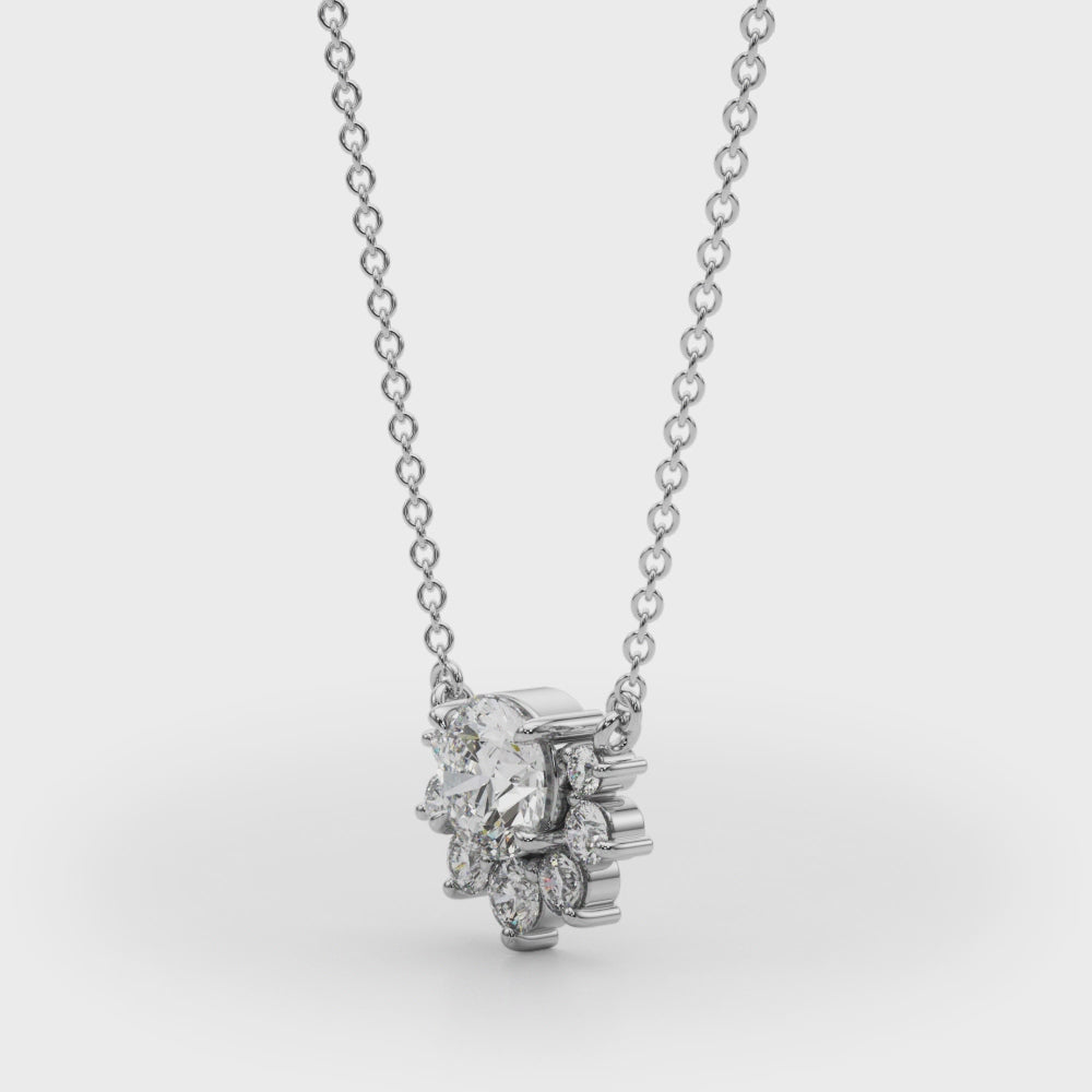 14k gold pendant featuring a central lab-grown Lovinity diamond surrounded by smaller diamonds in a floral design.