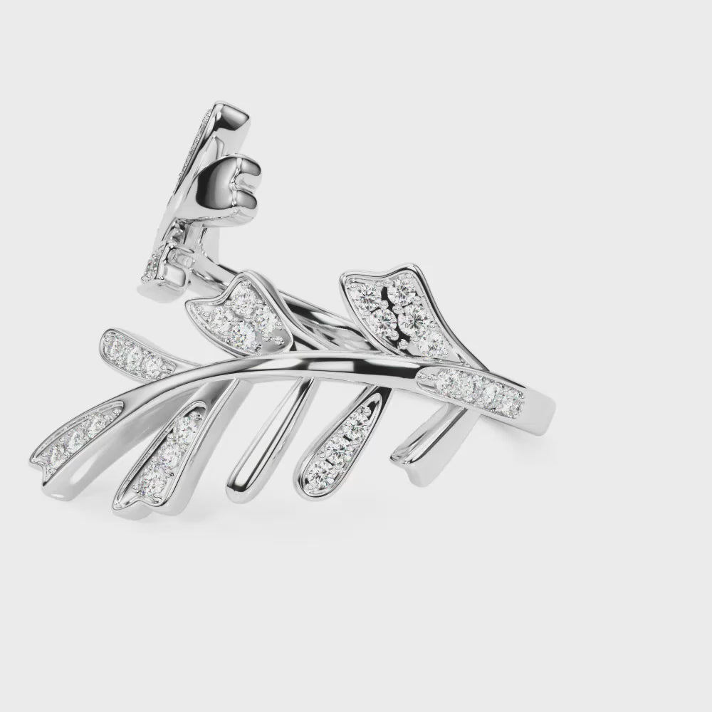 14k white gold leaf-shaped diamond ring, symbolizing nature and growth.