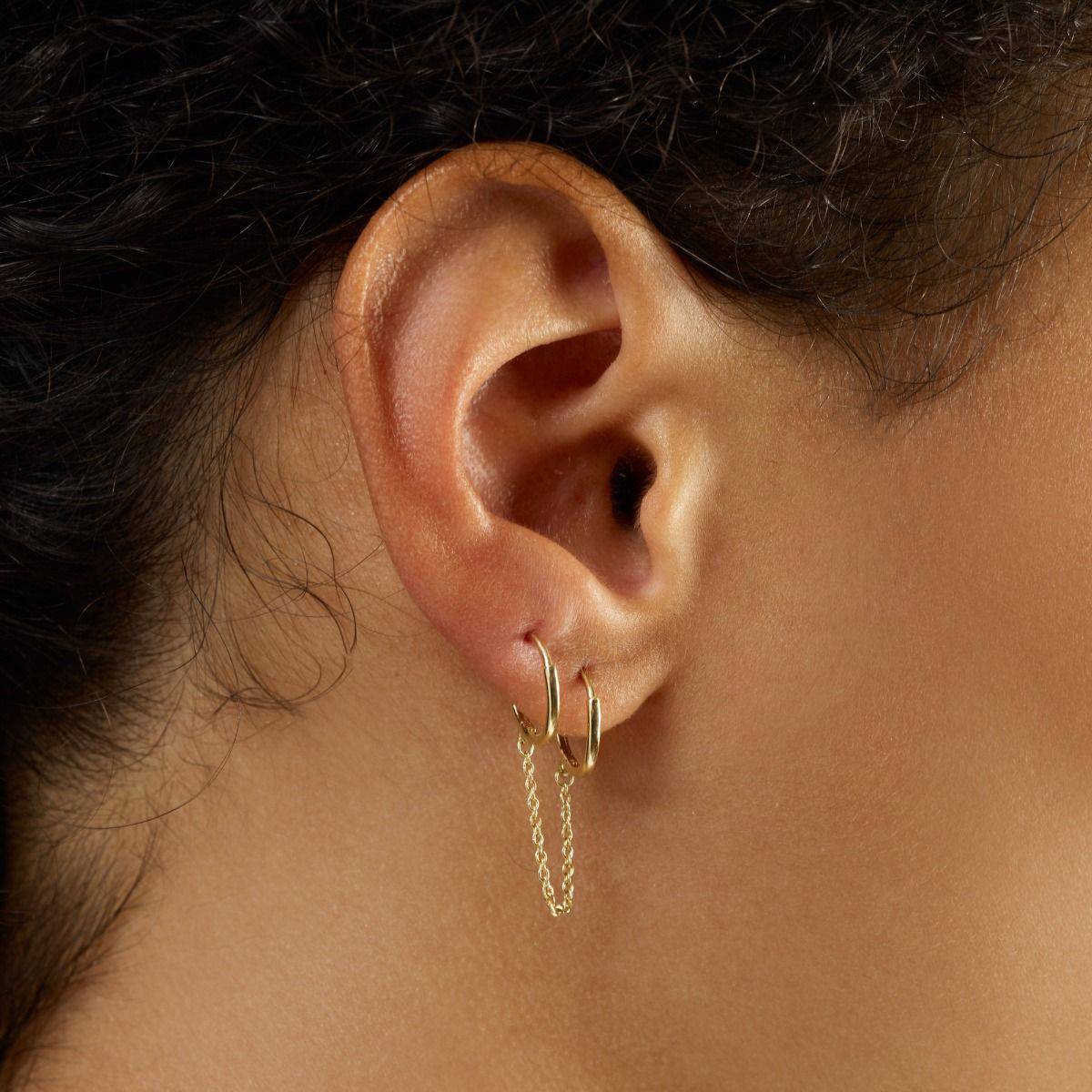 14k gold chain earrings from Lovinity’s Unity Collection, featuring two minimalist bars linked by a delicate chain, symbolizing connection and elegance.