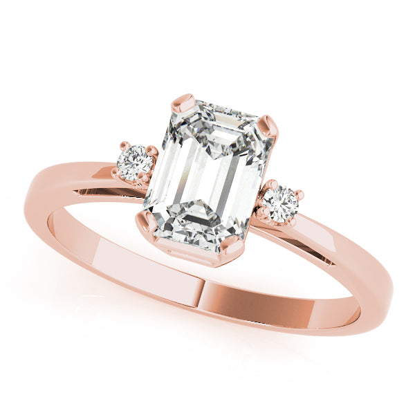 14k gold emerald cut diamond three-stone engagement ring featuring lab-grown diamonds.
